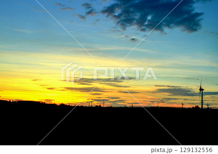 Golden Sunset with Wind Turbines at Longgang Miaoli Taiwan. Golden Sunset with Wind Turbines at Longgang Miaoli Taiwan. 129132556