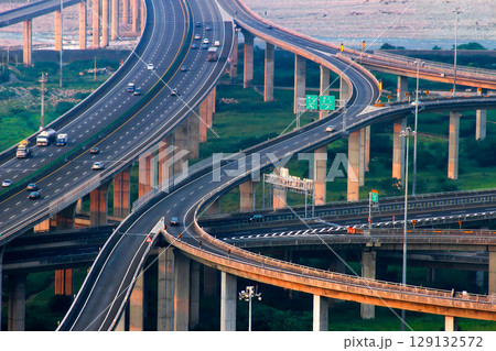 Zhongqing Interchange traffic at dusk in Taichung, Taiwan. Zhongqing Interchange traffic at dusk in Taichung, Taiwan. 129132572