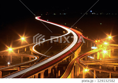 Zhongqing Interchange at night with motion light trails in Taichung, Taiwan. Zhongqing Interchange at night with motion light trails in Taichung, Taiwan. 129132582