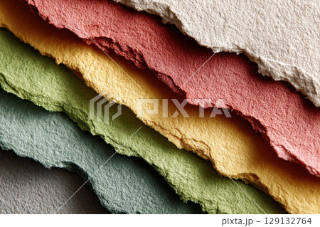 Colored paper sheets texture torn edge background 129132764