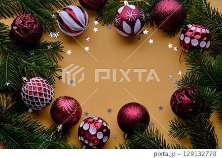 Christmas new year yellow background. Place for the text in Christmas decoration. Christmas new year yellow background. Place for the text in Christmas decoration. 129132778