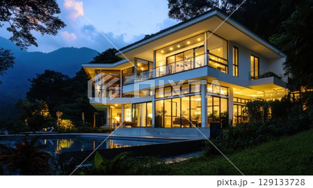 Modern residence at dusk in nature 129133728