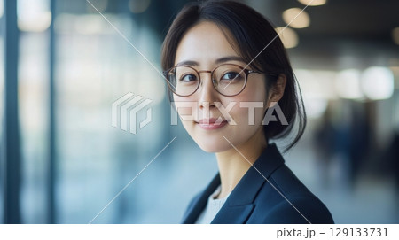 Smiling woman at work 129133731