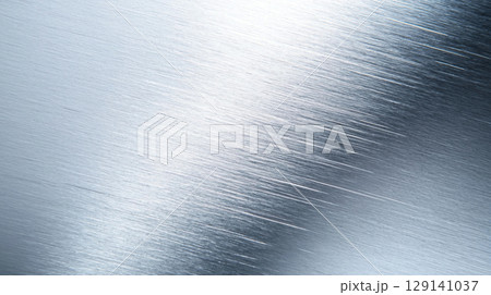 Abstract background Brushed metallic surface with reflective texture and smooth finish, creating modern and sleek appearance. Ideal for backgrounds and design elements 129141037