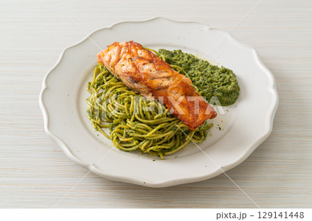 Spaghetti pesto with grilled salmon Spaghetti pesto with grilled salmon 129141448