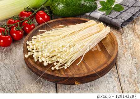 Raw enoki mushroom for cooking 129142297