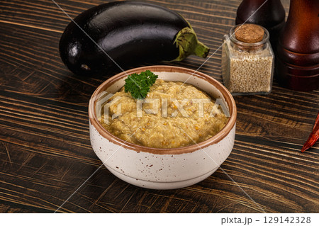 Eggplant dip - Mutabal with tahini paste Eggplant dip - Mutabal with tahini paste 129142328