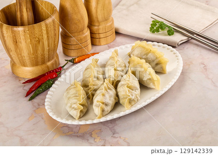 Japanese steamed Gyoza stuffed dumplings Japanese steamed Gyoza stuffed dumplings 129142339