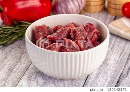 Raw beef meat cubes pieces 129142371