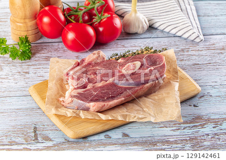Raw lamb steak with bone Raw lamb steak with bone 129142461