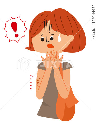 腕のシミに驚く女性 129144473