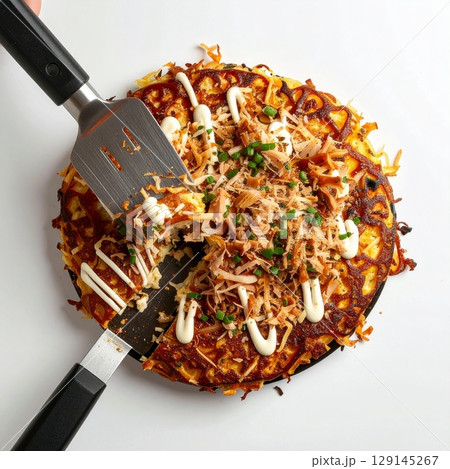 a piece of pizza with a filling 129145267