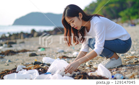 海岸でゴミを拾う若い日本人女性　generative ai 129147045