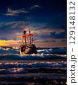 Grand view of an old sailing ship from the times of pirates on the high seas with big waves 129148132