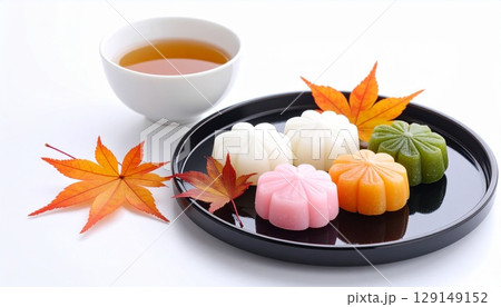 japanese dessert custard tart with colorful leaves 129149152