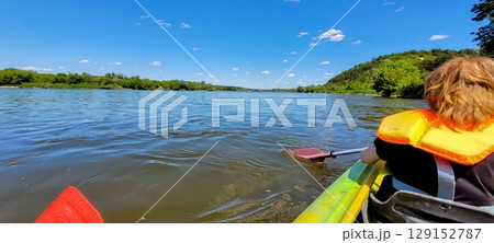 Kayaking Adventure on a Beautiful Sunny Day at the River, Enjoy Natures Wonders 129152787