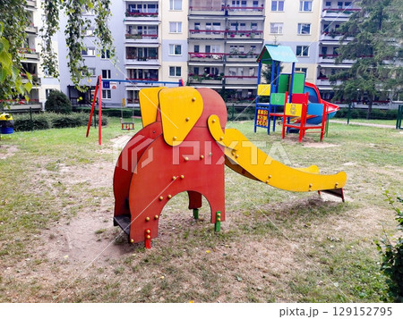 Experience a Delightful and Colorful Elephant Slide in a Vibrant Urban Playground for Kids Experience a Delightful and Colorful Elephant Slide in a Vibrant Urban Playground for Kids 129152795