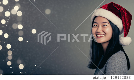 Beautiful asian woman, cosmetology, beauty, festive makeup, Merry Christmas and Happy New Year, banner with copy space 129152888
