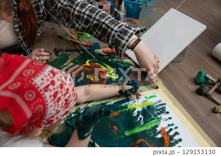 Join us for a delightful Creative Art Session that engages Children with Paints and Colors 129153130