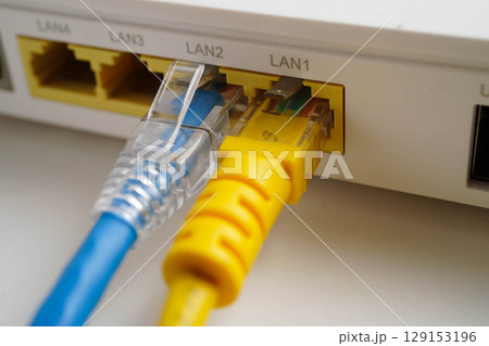 Ethernet cable with wireless router connect to internet service provider network. 129153196