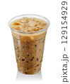 Iced coffee with milk in fogged disposable plastic cup isolated on white background 129154929