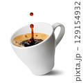 Small inclined espresso cup with freshly brewed coffee with splash and drop, isolated on white background 129154932