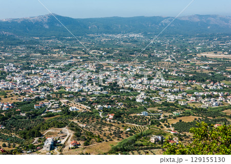 View of Ialyssos from Filerimos Monastery hill. Mediterranean Sea and Mountains in Rhodos, Greece View of Ialyssos from Filerimos Monastery hill. Mediterranean Sea and Mountains in Rhodos, Greece 129155130