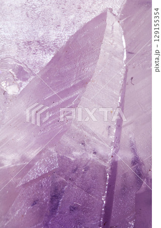 Beautiful close up of quartz crystal rock shard with reflective rainbow spiritual light Beautiful close up of quartz crystal rock shard with reflective rainbow spiritual light 129155354