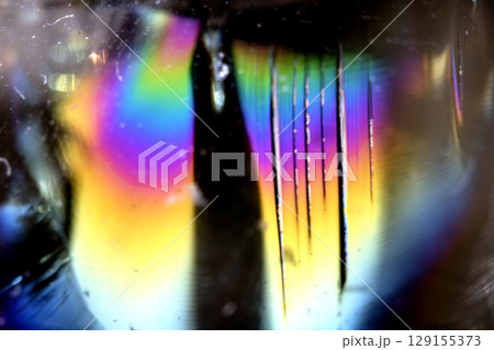Beautiful close up of quartz crystal rock shard with reflective rainbow Holographic  spiritual light 129155373