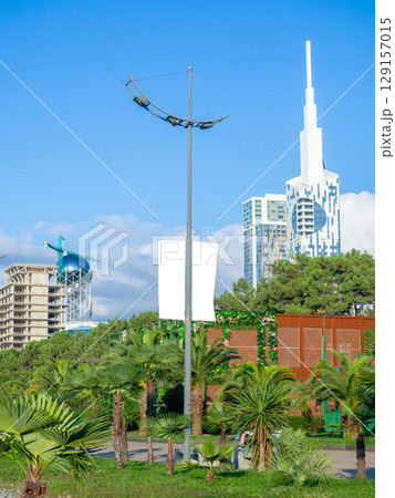 Advertising mockup on a light pole. Resort mockup. Free space for inscription. 129157015