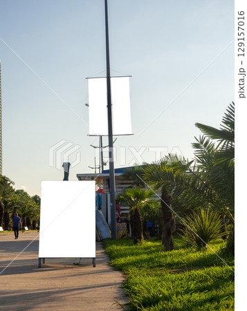 Advertising mockup on a light pole. Resort mockup. Free space for inscription. 129157016