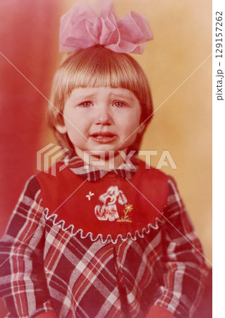 A two-year-old girl cries in a photo studio in the USSR 1983 A two-year-old girl cries in a photo studio in the USSR 1983 129157262