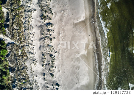 topdown drone view of a baltic sandy beach 129157728
