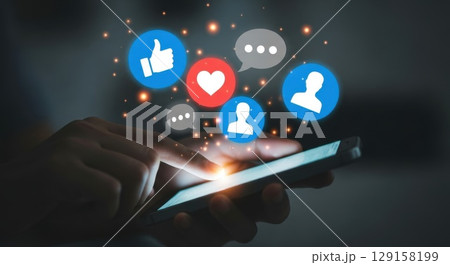 composite image of hand holding smartphone 129158199