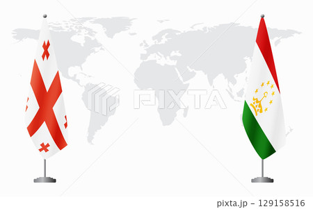 Georgia and Tajikistan flags for official meeting 129158516