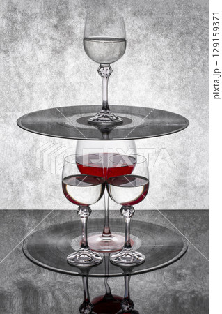 Still life with a glass of red wine with vinyl records Still life with a glass of red wine with vinyl records 129159371