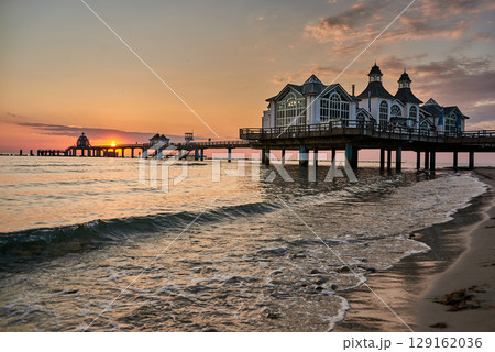 historic Pier of Sellin in sunrise mood at baltic sea historic Pier of Sellin in sunrise mood at baltic sea 129162036