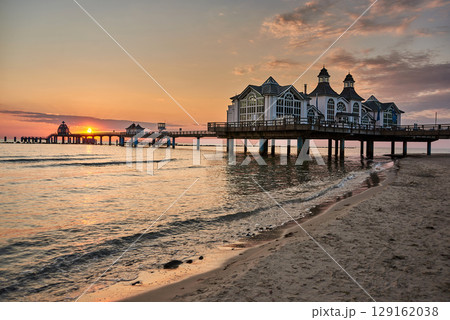historic Pier of Sellin in sunrise mood at baltic sea historic Pier of Sellin in sunrise mood at baltic sea 129162038