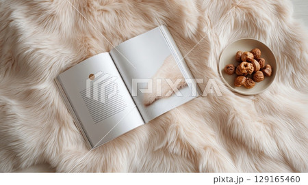 Cozy Reading Setup with Magazine and Snacks Cozy Reading Setup with Magazine and Snacks 129165460