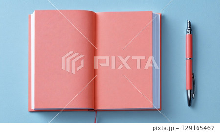 Open Notebook and Pen on Light Blue Background 129165467