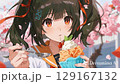 満開の桜とかき氷を食べる女の子 129167132