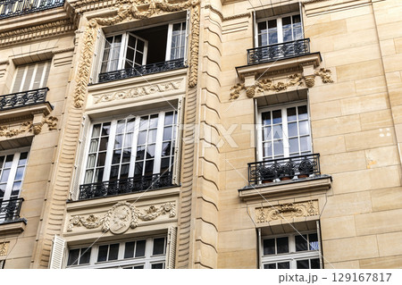 Facade of residential building in Paris, France Facade of residential building in Paris, France 129167817