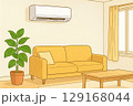 壁上のエアコンと観葉植物のあるリビング 129168044
