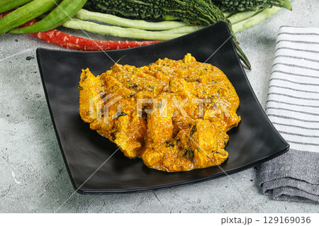 Spicy chicken masala in the bowl Spicy chicken masala in the bowl 129169036
