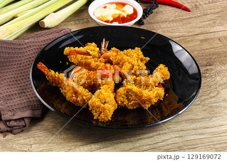 Golden deep prawn tempura wuth sauce 129169072