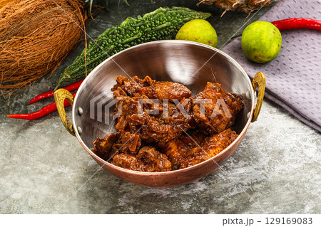 Indian cuisine - Vindaloo fish with spices Indian cuisine - Vindaloo fish with spices 129169083