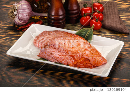 Raw marinated duck breast for cooking Raw marinated duck breast for cooking 129169104