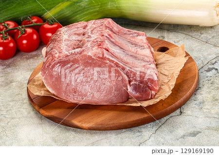 Raw pork loin cut with bone 129169190