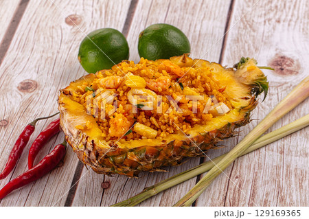 Seafood fried rice in pineapple half Seafood fried rice in pineapple half 129169365