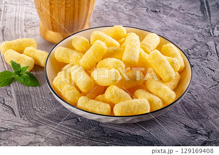 Golden crispy sweet corn sticks Golden crispy sweet corn sticks 129169408